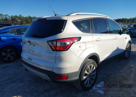 2017 Ford Escape Titanium z USA, uszkodzony, nr VIN 1FMCU0J94HUD64422